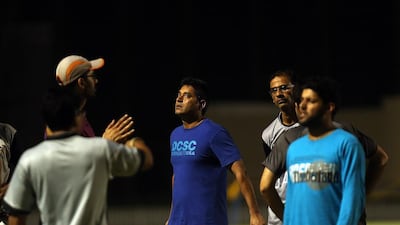 11 Yodhin Punja, 19* (not pictured): Named in the 30-man preliminary squad for the World Cup, even though he was only 15 at the time. Aaqib, centre, knows all there is to know about pace bowlers, so he must have seen something good in the Abu Dhabi schoolboy. Satish Kumar / The National