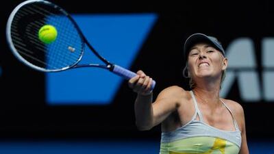 Maria Sharapova makes short work of opponent Olga Puchkova at the Australian Open in Melbourne.