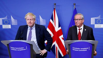 Jean-Claude Juncker, European Commission president at the time, and then-British prime minister Boris Johnson attend a press conference after agreeing on the Brexit deal. Reuters