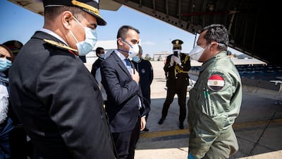 Airport staff unload medical aid sent to Italy from Egypt near Rome. EPA
