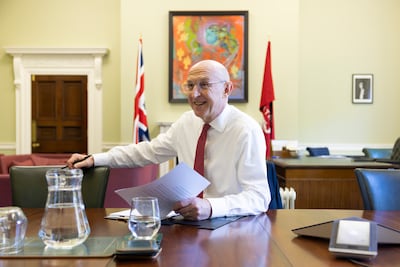 Chancellor John Healey prepares for the budget in his office in HM Treasury. Treasury