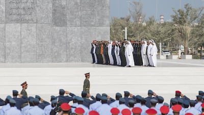 Sheikh Mohammed bin Zayed, Crown Prince of Abu Dhabi and Deputy Supreme Commander of the UAE Armed Forces, observes a moment of silence during a Commemoration Day flag raising ceremony at Wahat Al Karama, a memorial dedicated to the memory of the UAE’s national heroes in honour of their sacrifice and in recognition of their heroism. He is seen with Major General Sheikh Khaled bin Mohammed bin Zayed, Chairman of the UAE State Security Department, Sheikh Khalifa bin Tahnoun bin Mohamed Al Nahyan, Lt General Hamad Al Romaithi, Chief of Staff UAE Armed Forces, Major General Essa Saif Al Mazrouei, Deputy Chief of Staff of the UAE Armed Forces, Mohammed Mubarak Al Mazrouei, Undersecretary of the Crown Prince Court of Abu Dhabi, and others. Philip Cheung / The Crown Prince Court - Abu Dhabi