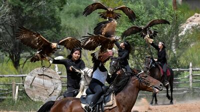 Kyrgyz riders in the Traditional Eagle Hunting Festival at Salbuurun near the Issyk-Kul Lake, 213km south-east of Bishkek in Kyrgyzstan. AP