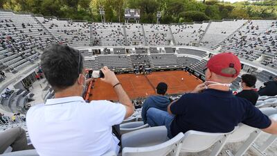 Spectators wearing protective face masks in the stands at the Italian Open in Rome. EPA