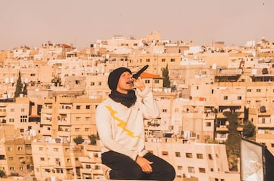 Chris Martin singing from the top of the citadel in Amman. Instagram