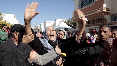 The mother, centre, of Yassine al-Abidi, who gunned down 22 foreign tourists at Tunisia's Bardo Museum on March 18, 2015. seen here crying during her son's funeral in Tunis, in this March 22, 2015 file photo. Zoubeir Souissi/Reuters