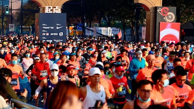 Runners take part in the 2020 Shanghai marathon. AFP