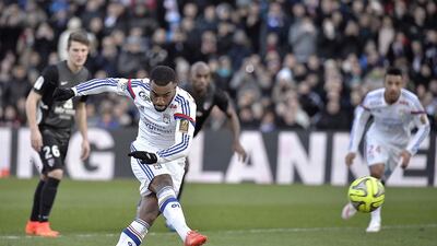 Alexandre Lacazette attracted interest from a host of clubs before committing his future to Lyon. Jeff Pachoud / AFP