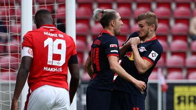 Leipzig's German forward Timo Werner, right, celebrates scoring their fourth goal against Maainz with Slovenian midfielder Kevin Kampl. AFP