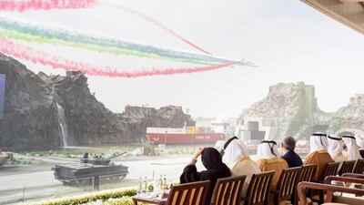 Dignitaries watch the Al Forsan aerobatic display team during the opening ceremony of the 2017 International Defence Exhibition and Conference. Mohamed Al Suwaidi / Crown Prince Court - Abu Dhabi