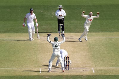 Australia's Nathan Lyon celebrates bowling out Harry Brook of England for 30 runs. Getty Images