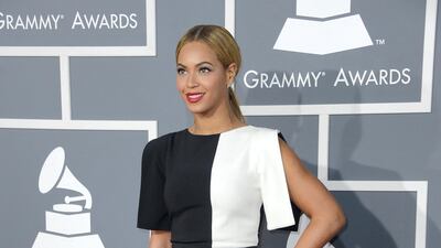 2013: Beyonce wears a monochrome Osman jumpsuit for the 55th annual Grammy Awards. EPA