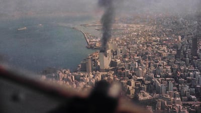Smoke rises from the Holiday Inn in Beirut on December 15, 1975, the year the country’s civil war began. AP