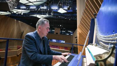 Setting new musical heights, German-born innovator David Klavins has crafted what is believed to be the world's largest vertical piano that sits in a concert hall in Latvia. AFP