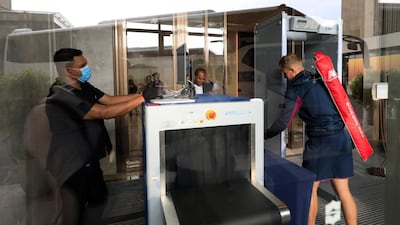 Root goes through a security scanner as he arrives at the hotel. Reuters