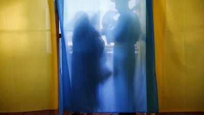 People fill out their ballots in voting booths at polling station in the village of Kosmach in the Ivano-Frankivsk region of western Ukraine. Ukrainian polling stations opened on Sunday in a presidential election overshadowed by violence in the country’s mainly Russian-speaking east and by Russia’s annexation of Ukraine’s Crimea peninsula. Uters, Kacper Pempel/Reuters