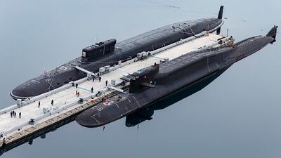 Russian nuclear submarines dock at a Russian naval base in Gazhiyevo, Kola Peninsula, on April 13, 2021. Russian Defence Ministry Press Service via AP