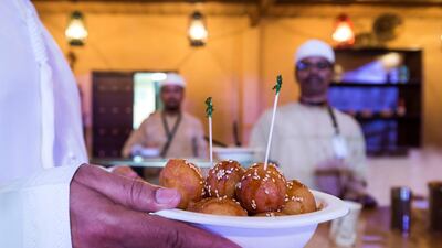 The ever-popular Emirati sweet luqaimat can be found at an Emirati restaurant at the festival. Leslie Pableo for The National