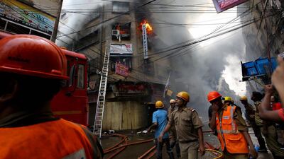 Firefighters attempt to make inroads on the fire. EPA