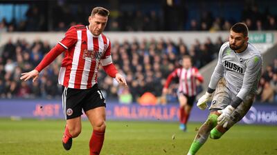 Billy Sharp of Sheffield United takes on Bartosz Bialkowski of Millwall during the FA Cup Fourth Round match at The Den on January 25, 2020 in London. Getty Images
