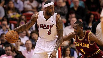 LeBron James, left, is not considering playing abroad and is optimistic the NBA will be saved this season.