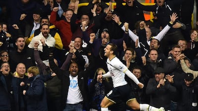 Tottenham Hotspur striker Roberto Soldado celebrates in front of supporters after scoring during the English Premier League match against Everton at White Hart Lane in north London on November 30, 2014. Ben Stansall / AFP