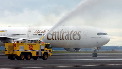 An Emirates aircraft gets hosed down in 2003 after touching down at Auckland International Airport, New Zealand. Getty Images