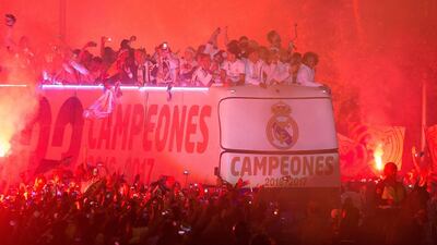 Real Madrid players arrive at Cibeles square after winning the Primera Liga title. Denis Doyle / Getty Images