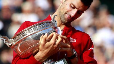 Novak Djokovic slumped after winning the French Open and completing the career Grand Slam in June. Robert Ghement / EPA