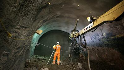 An engineer checks progress on a crossover rail tunnel. Peter Macdiarmid / Getty Images