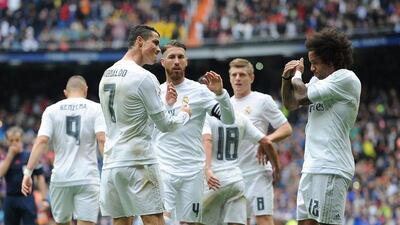 Cristiano Ronaldo, second from left, of Real Madrid celebrates with Marcelo, right, after scoring against Valencia at Estadio Santiago Bernabeu on May 8, 2016. Denis Doyle/Getty Images