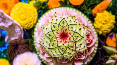 A carved watermelon is displayed during a fruit and vegetable carving competition in Bangkok. Robert Schmidt / AFP