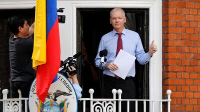 Mr Assange prepares to speak from the balcony of Ecuador's embassy in August 2012. Reuters