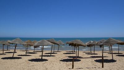 Tunisia began deploying armed police around tourist sites after the recent massacre at a beach resort which has left the economy ailing and popular areas deserted. Kenzo Tribouillard / AFP