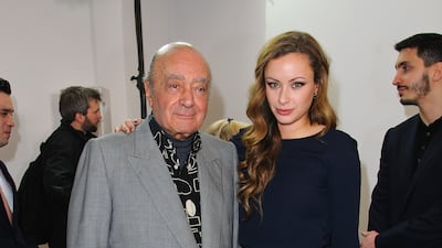 With one of his daughters, Camilla Al-Fayed, in London in 2014. Getty Images