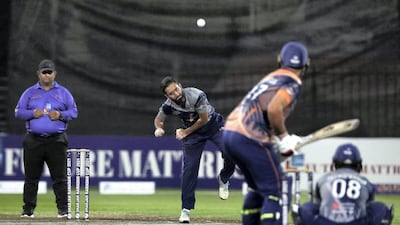 Pacific Group's Mujahid bowls in the Sharjah Ramadan Cup game against MGM Cricket Club