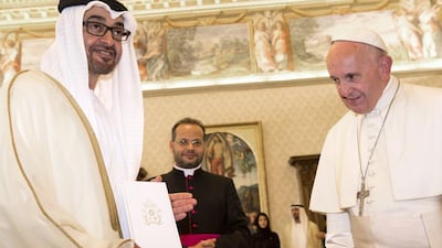 Crown Prince of Abu Dhabi and Deputy Supreme Commander of the UAE Armed Forces, Sheikh Mohamed bin Zayed, and Pope Francis exchange gifts at the Vatican. Claudio Peri / Pool Photo via AP