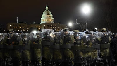 Riot police prepare to move demonstrators away from the US Capitol. AFP