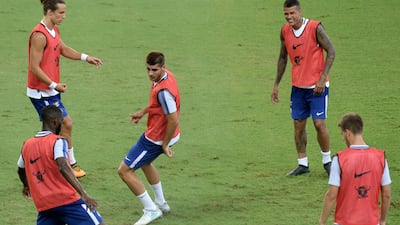 Chelsea's Alvaro Morata, centre, participates in a training session with teammates in Singapore on July 24, 2017, ahead of the International Champions Cup football match between Bayern Munich and Chelsea on July 25. Roslan Rahman / AFP