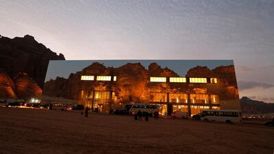 Mountains reflected on the Mirror Concert Hall, where the 41st Gulf Cooperation Council (GCC) was held, in Al Ula, Saudi Arabia, January 5. AP
