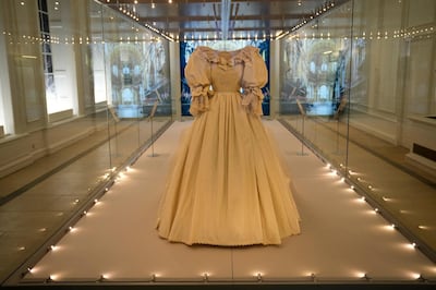 The wedding dress of Princess Diana is displayed in the Royal Style in the Making exhibition at Kensington Palace in London. AP Photo