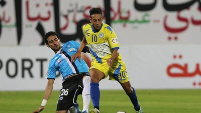Kamel Chafni, right, Al Dhafra’s No 10, may be one of the finest players in the country, but he could not sustain his brilliance on Tuesday night. Mostafa Reda / Al Ittihad
