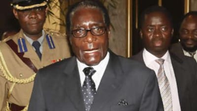 Zimbabwe's president, Robert Mugabe, arrives for talks at the Rainbow Towers hotel in Harare.