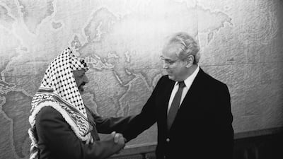 Javier Perez de Cuellar, Secretary-General of the United Nations, meets with Yasser Arafat, President of the Palestinian Authority and Chairman of Palestine Liberation Organization, in Geneva.