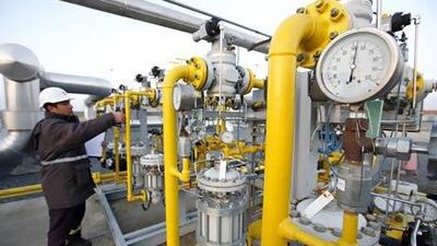 A worker checks the valve gears at a natural gas storage facility in Kinali. Turkey is heavily dependent on imports of oil and natural gas. Osman Orsal / Reuters