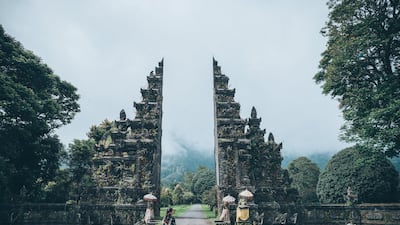 Bali plans to offer vaccines to tourists but will delay reopening due to rising Covid-19 cases. Unsplash / Kharl Anthony Paica