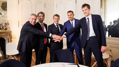 French President Emmanuel Macron and MGX vice chairman Khaldoon Al Mubarak took part in a signing ceremony to expand an AI campus in France on Monday.
