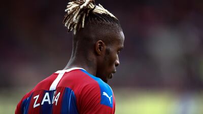 Wilfried Zaha of Crystal Palace and his 'man bun'. Getty