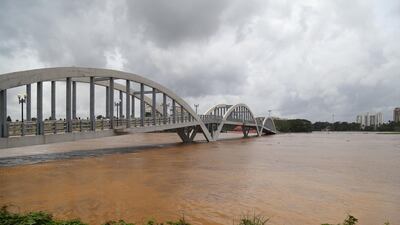Water flows under a bridge following heavy rain. EPA