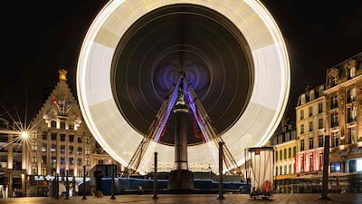 A Ferris wheel on Christmas Eve in Lille. AFP
